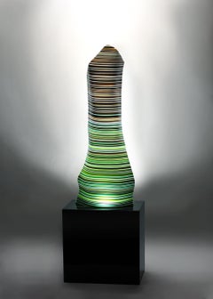 Magikarpet Linear Warm Green Barcode Glass Lamp over Black Granite Lighting Base
