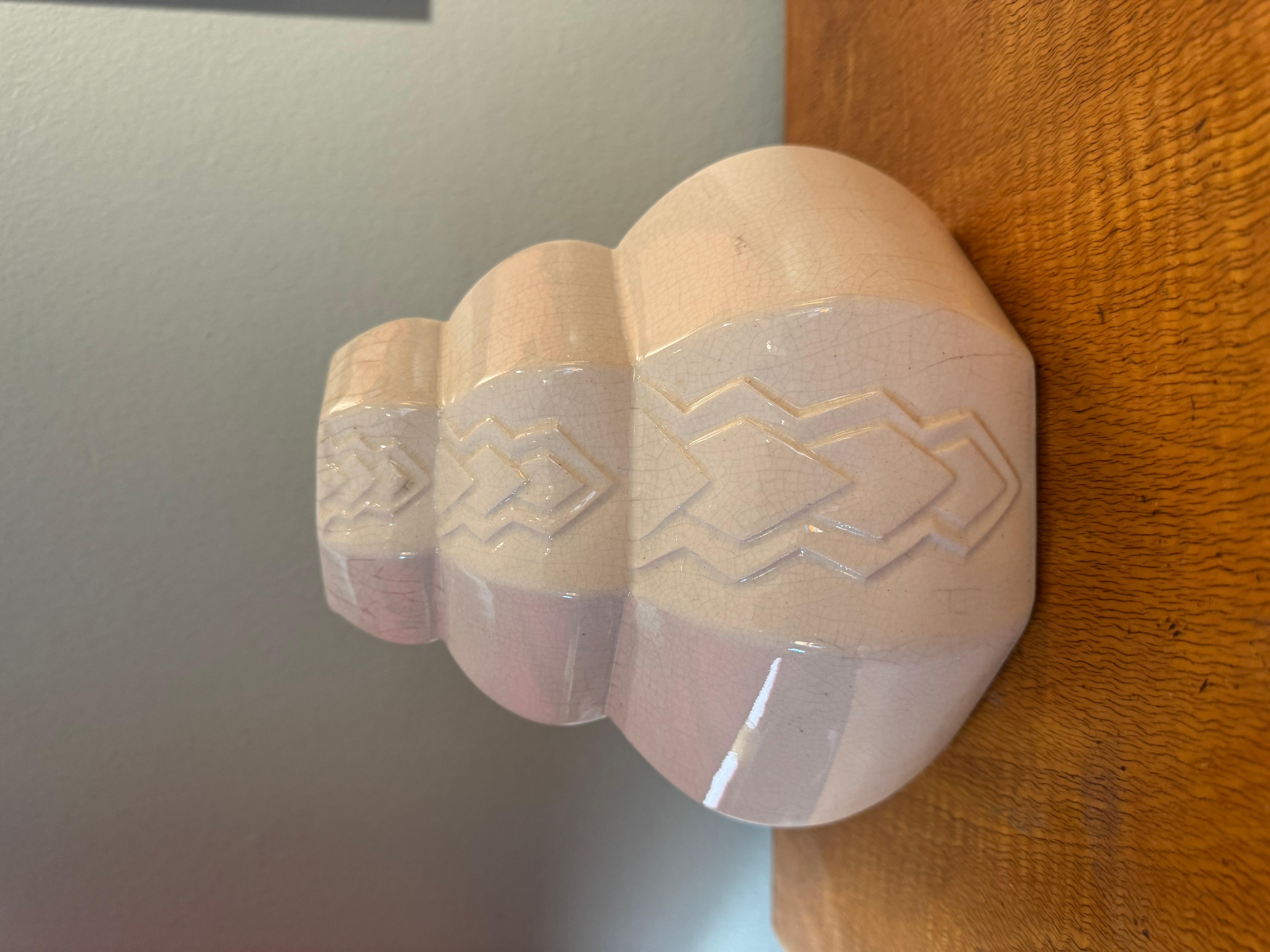 Gorgeous craquele ceramic vase, made in France in 1930.
The firing technique called craquele is the most sophisticated in the twentieth century; in fact, it involves firing the pottery to the limit of breaking it.
Doing so gives a unique texture to