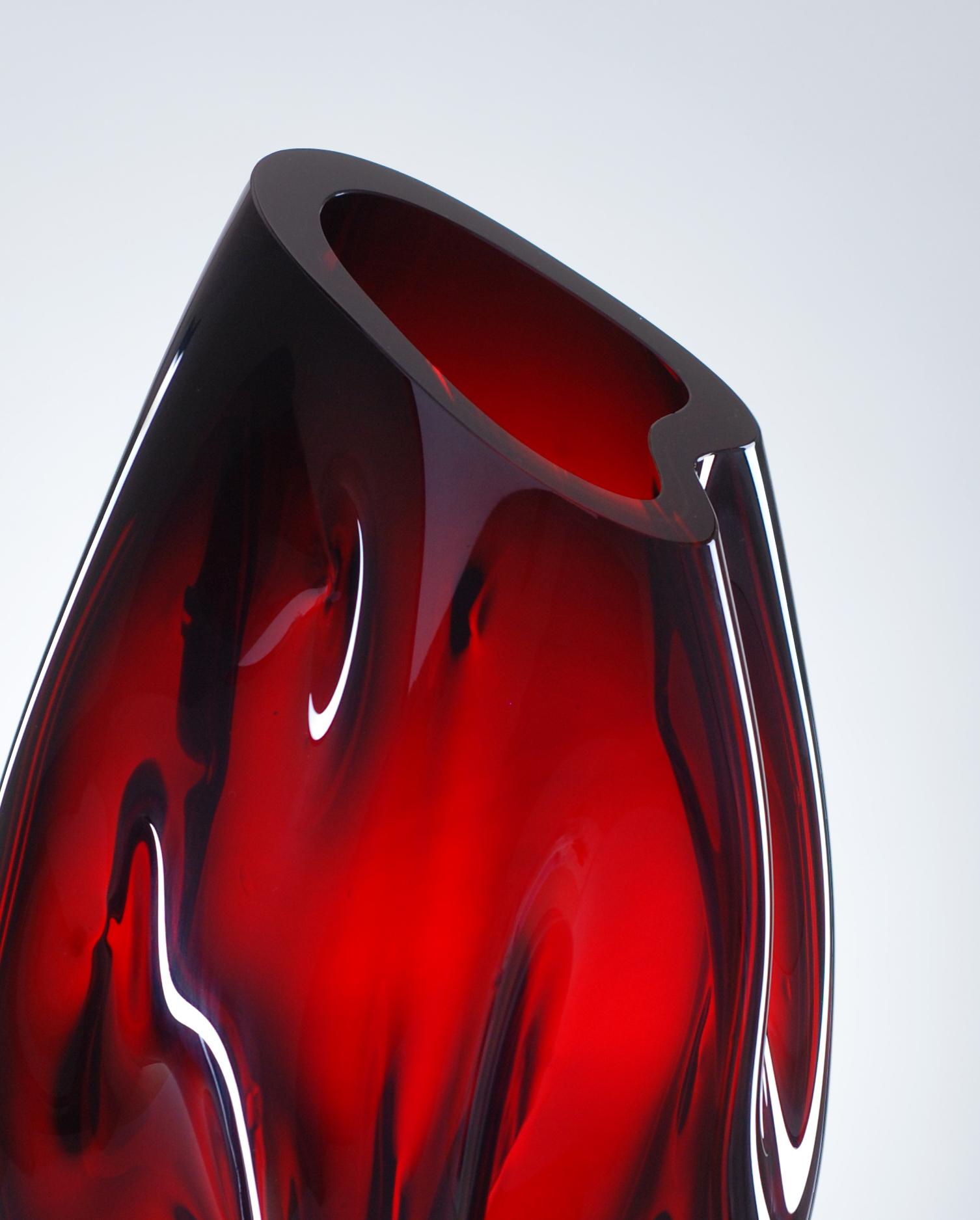 Hand blown glass vase, monumental size. Gold Ruby Red glass, almost black in massif. Smooth on surface. Original. Organic shape. Freehand shaped. Heavy solid glass.

This piece is part of collection of sculptural glass objects, vases and bowls.