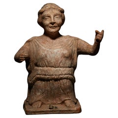 Magna Graecia Figure of a woman with dwarfism in terracotta