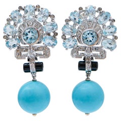 Magnesite, Topazi color acquamarina, Diamanti, Onice, Platino e  Orecchini in oro