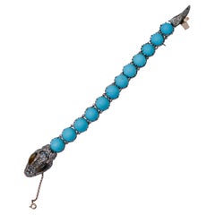 Magnesite, pietre, diamanti, topazi, bracciale a serpente in oro rosa e argento.
