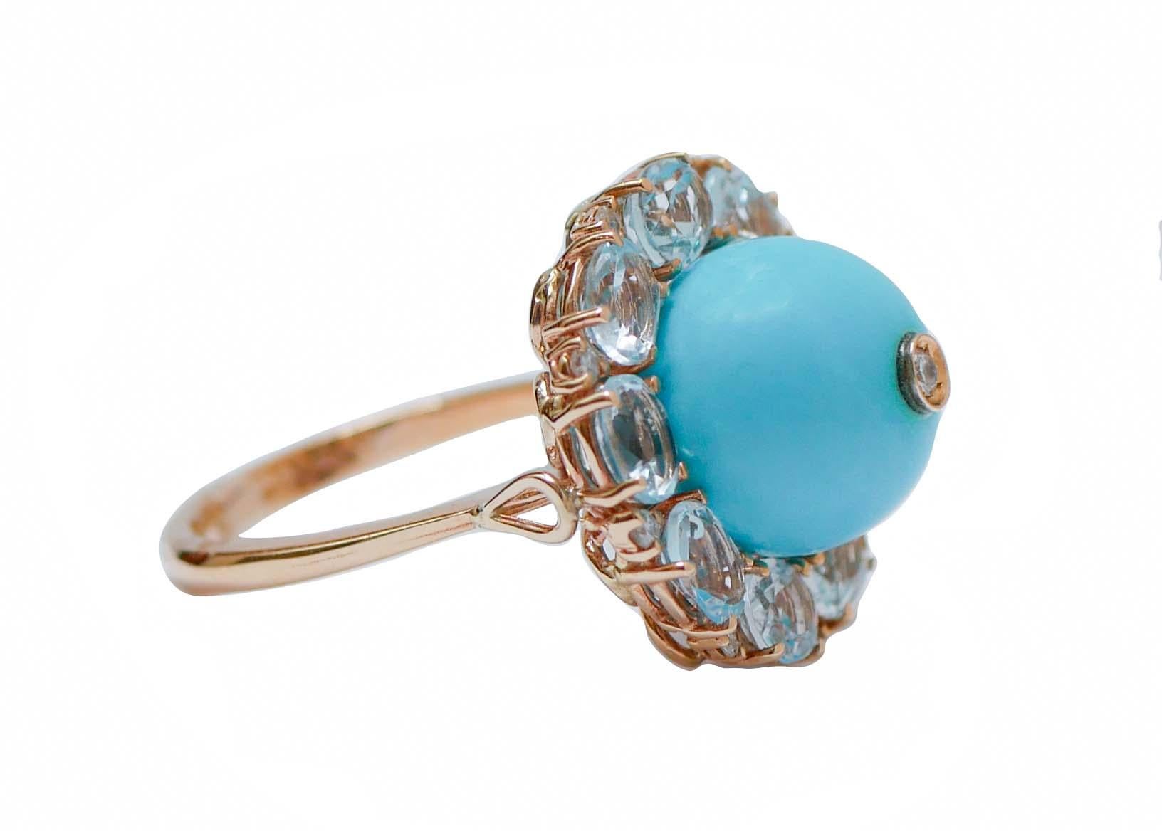 Anello moda con struttura in oro rosa 14 kt montato con una magnesite centrale con un diamante nella parte centrale circondato da topazi e diamanti.
Questo anello è stato realizzato totalmente a mano da maestri orafi italiani ed è in perfette