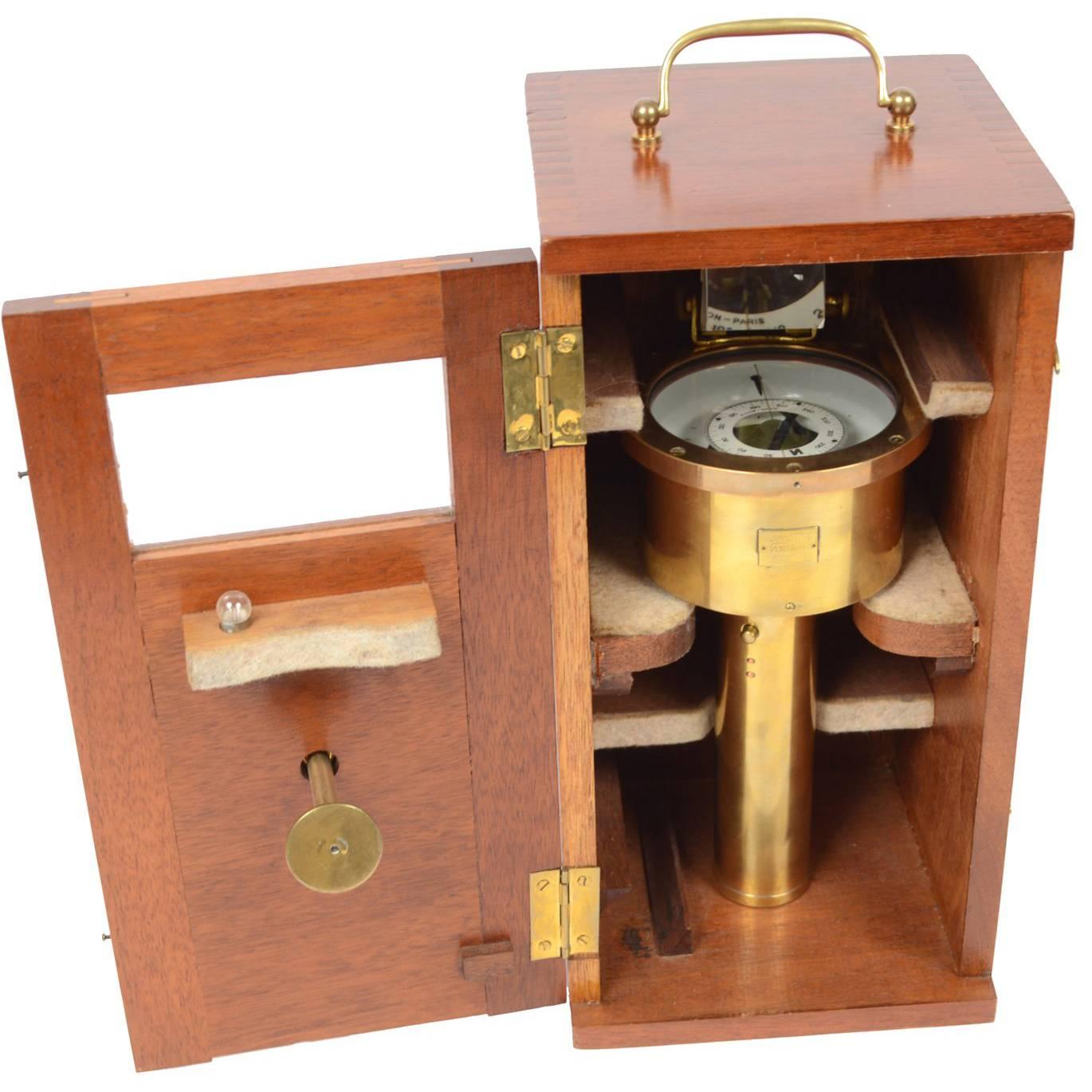 Antique and rare magnetic surveying compass, brass with original wooden box, signed E. Vion Paris, early 1900. Very good condition. Height of box cm 32 – inches 12.61. 
The firm Vion, that still works today, was established in 1830 in Paris and it