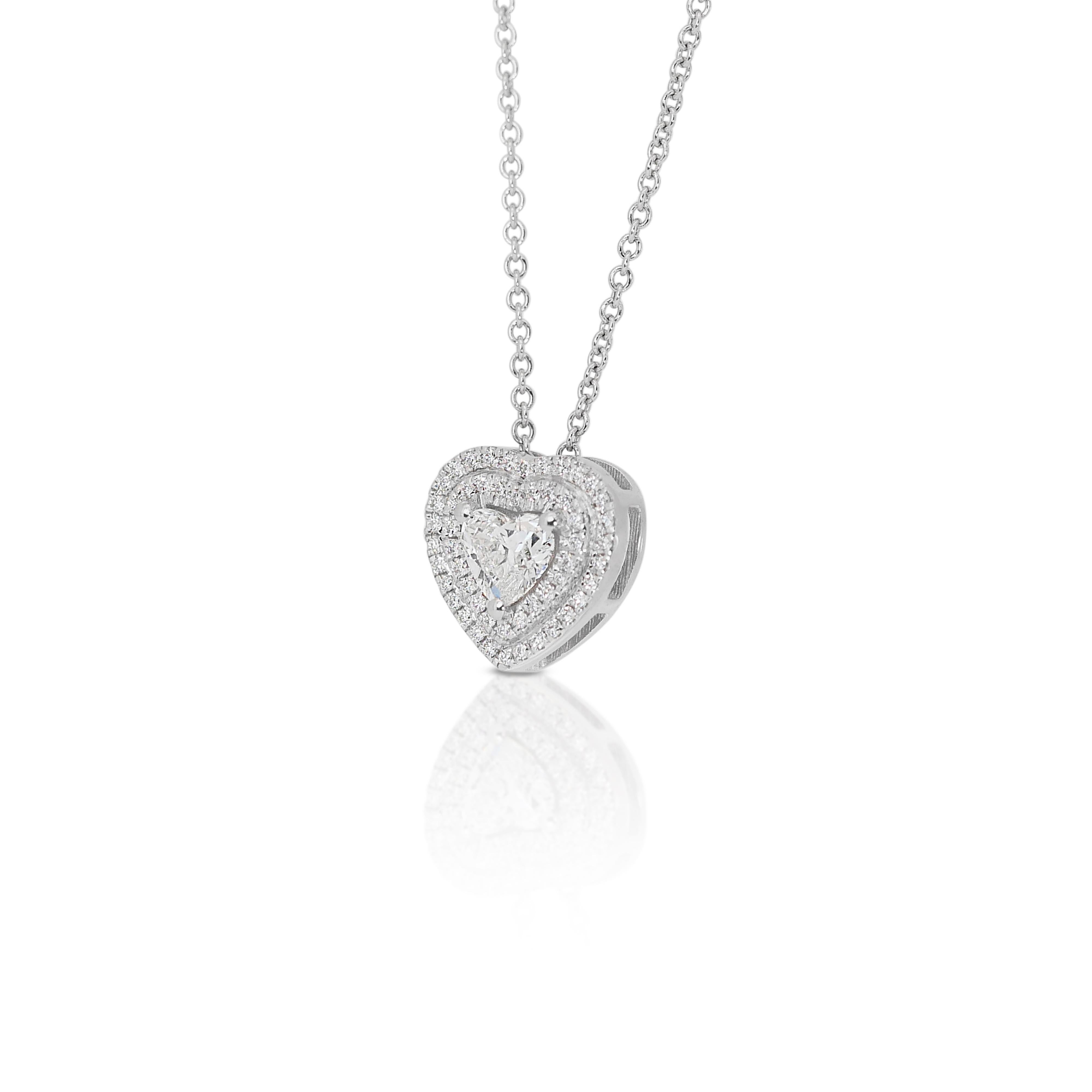 Magnificent 1.01ct Diamonds Double Halo Necklace with Pendant in 18k White Gold - GIA Certified

This breathtaking 18k white gold necklace features a captivating 0.71-carat heart-shaped diamond offering impeccable brilliance and rarity. Surrounded
