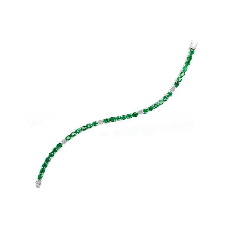 Bracelet Gold 14 K
Diamond 38-Round 57-0,2-4/5A
Emerald 32-Oval-10,24 4/(5)З₁A
Weight 14,77 grams

With a heritage of ancient fine Swiss jewelry traditions, NATKINA is a Geneva based jewellery brand, which creates modern jewellery masterpieces