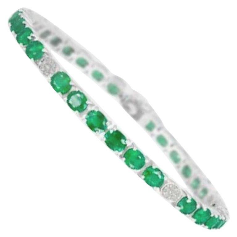 Magnifique bracelet tennis en or blanc 10 carats avec émeraudes vertes et diamants