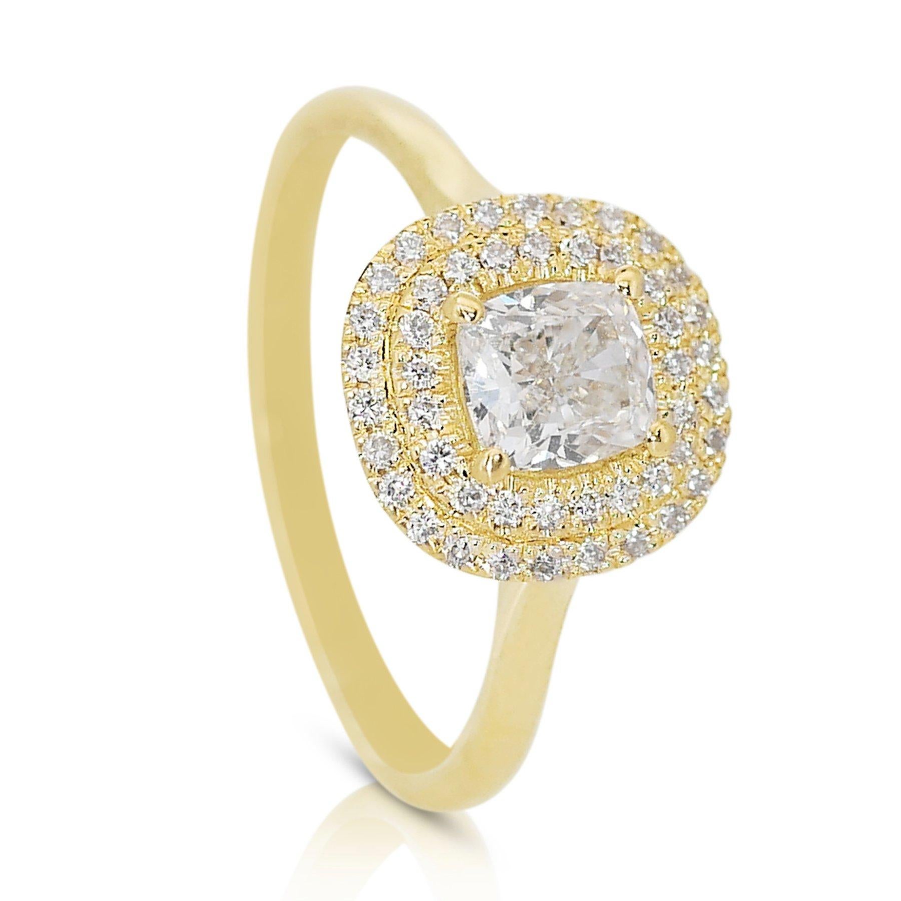 Magnifique bague double halo en or jaune 18k de 1,22 ct de diamant - certifiée GIA

Offrez-vous une élégance intemporelle avec cette exquise bague à double halo de diamants en or jaune 18k. La pièce maîtresse est un diamant de 1,00 carat en forme de