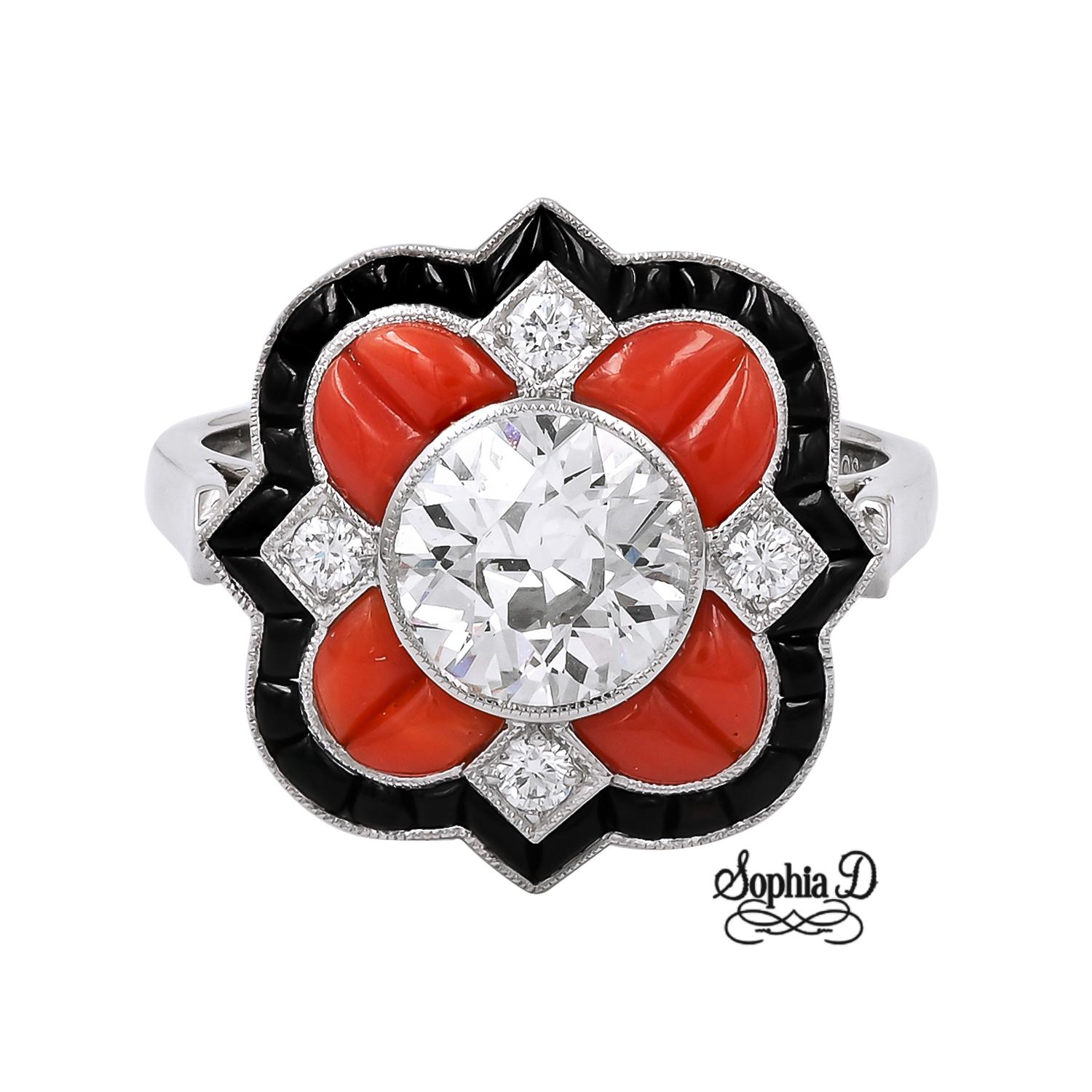 Diamonds, corals and onyx art deco ring by Sophia D. Set with a 1.23 carat round cut diamond and onyx and coral that total 0.75 carats in platinum setting. 

The ring is a size 6.5 and available for resizing.

Sophia D by Joseph Dardashti LTD has