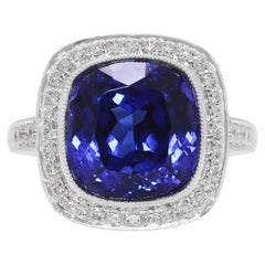 Magnificent 12.57ct Tanzanite and Diamond Halo Statement Ring in 18k White Gold Magnificent 12.57ct Tanzanite and Diamond Halo Statement Ring in 18k White Gold