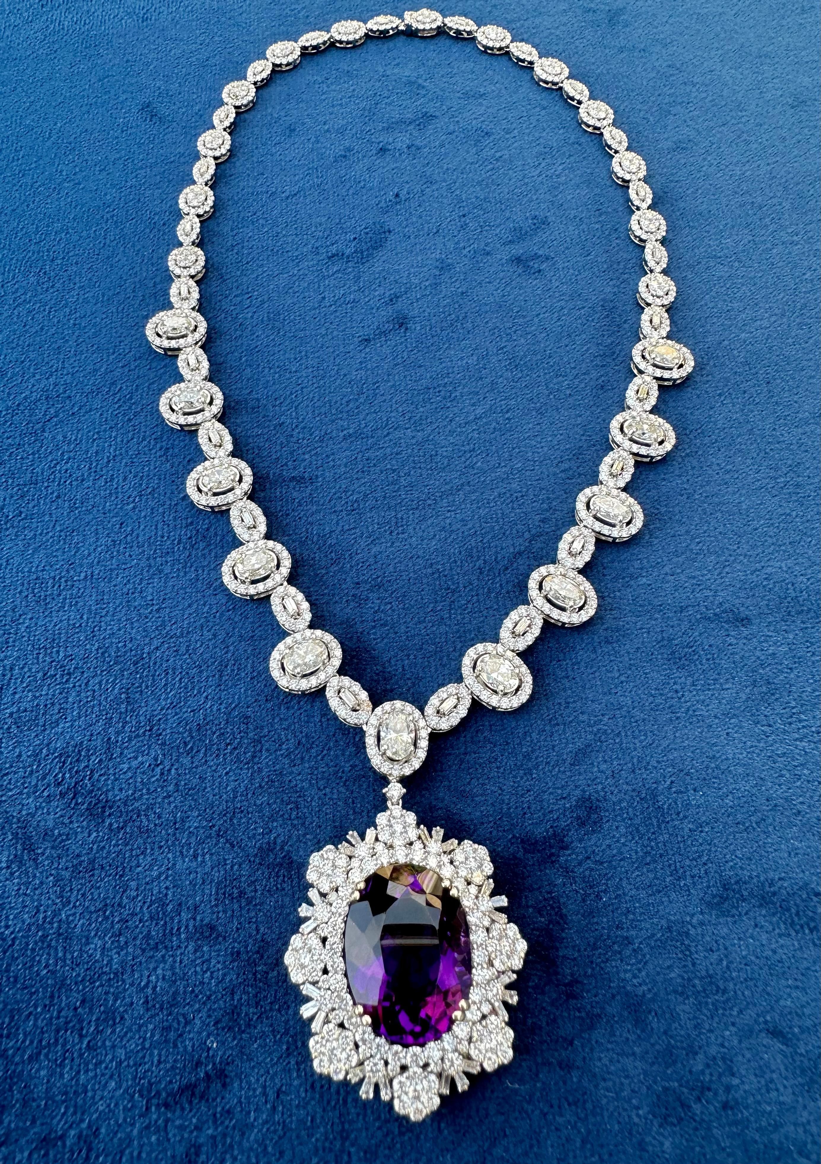 Magnificent, ladies estate 18 karat white gold, custom made approximately 137.22 carat total weight natural Brazilian amethyst and diamond medallion pendant necklace, with matching earrings and ring set.  Following is a detailed description of each