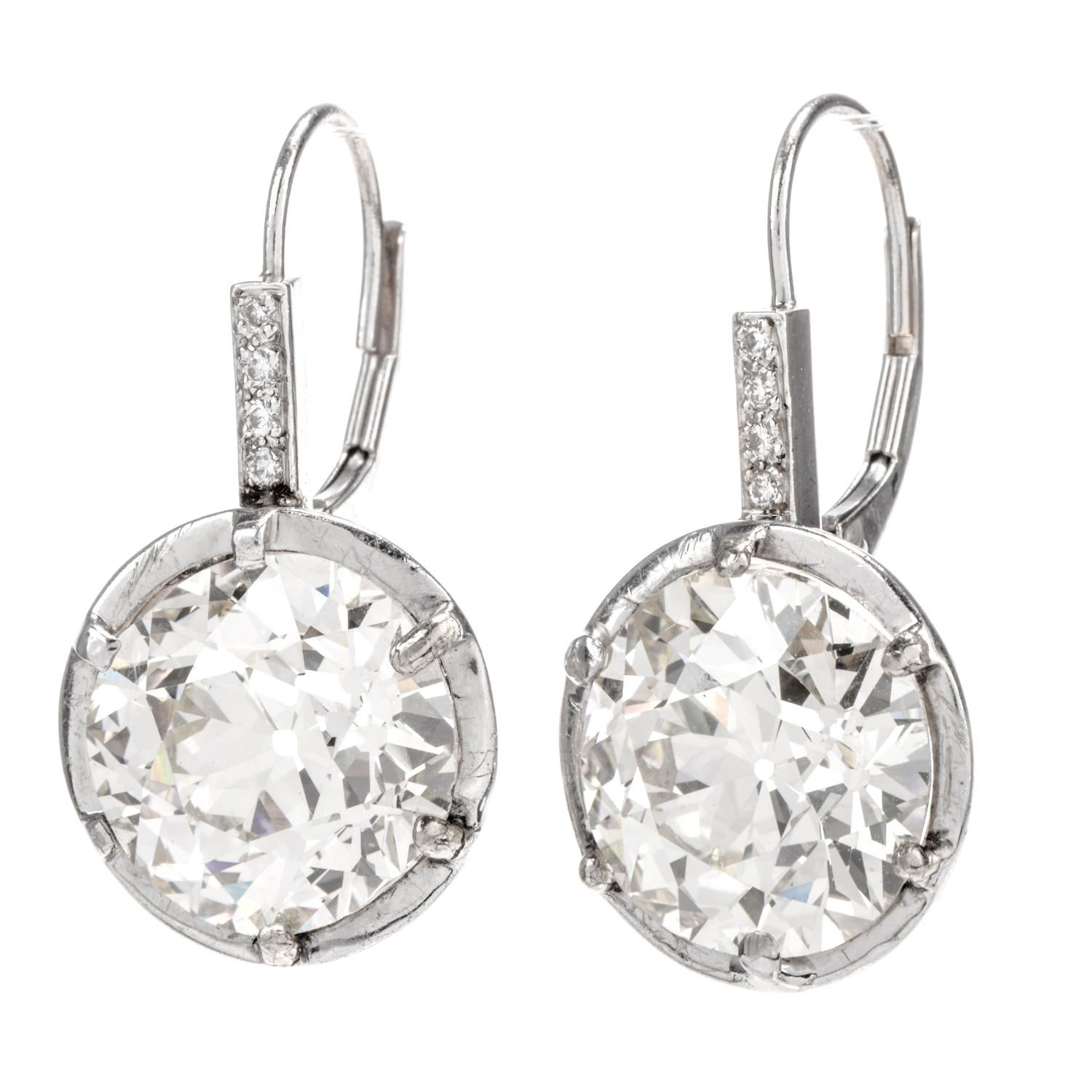 These will make a Statement ANYWHERE!

This magnificent pair of Vintage Old European Cut Diamond Earrings will make

any statement you wish to make!  Suspended from each eurowire is 

a single prongset diamond accented at the top by 4 brilliant cut