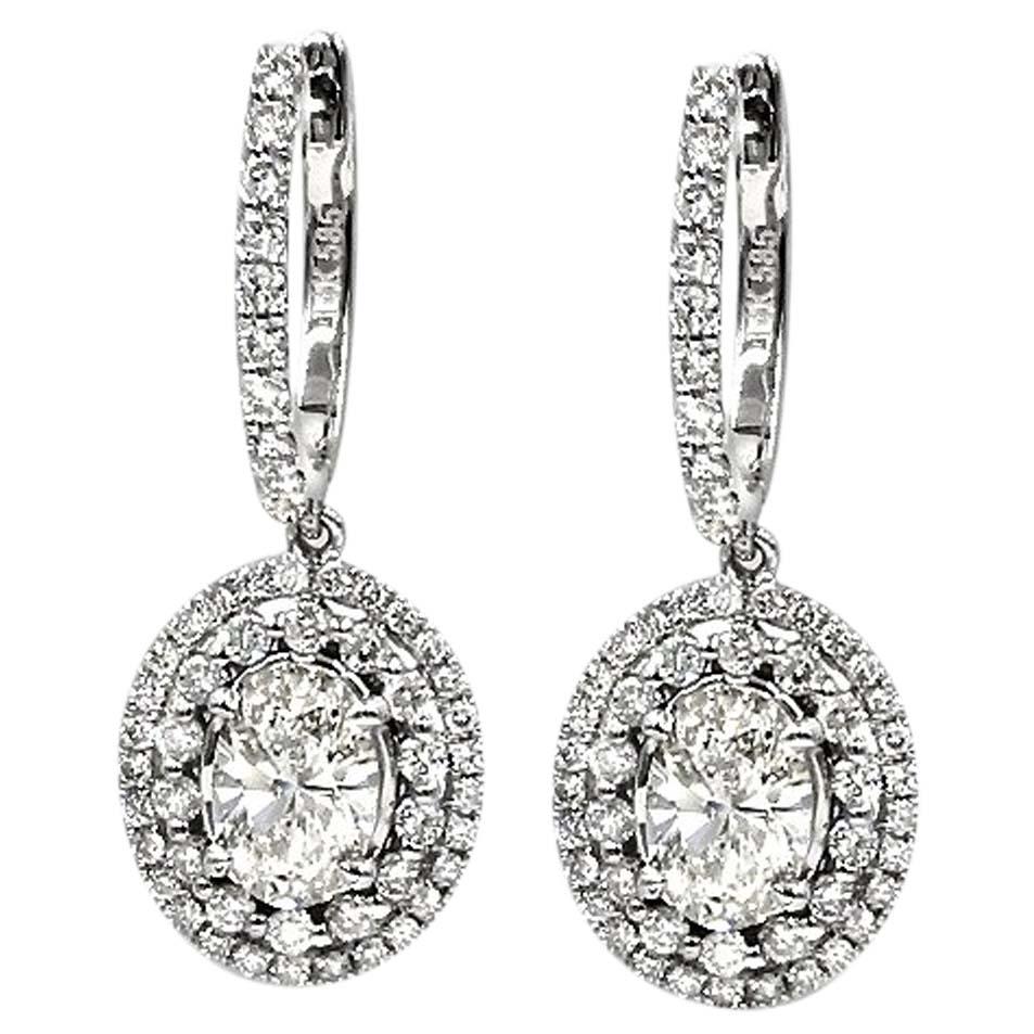 1.42 Carat Oval Cut Diamond Magnificent Drop Earrings with .94ct Round Diamonds For Sale
