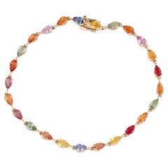 Magnifique bracelet en or jaune 14 carats avec saphirs multicolores