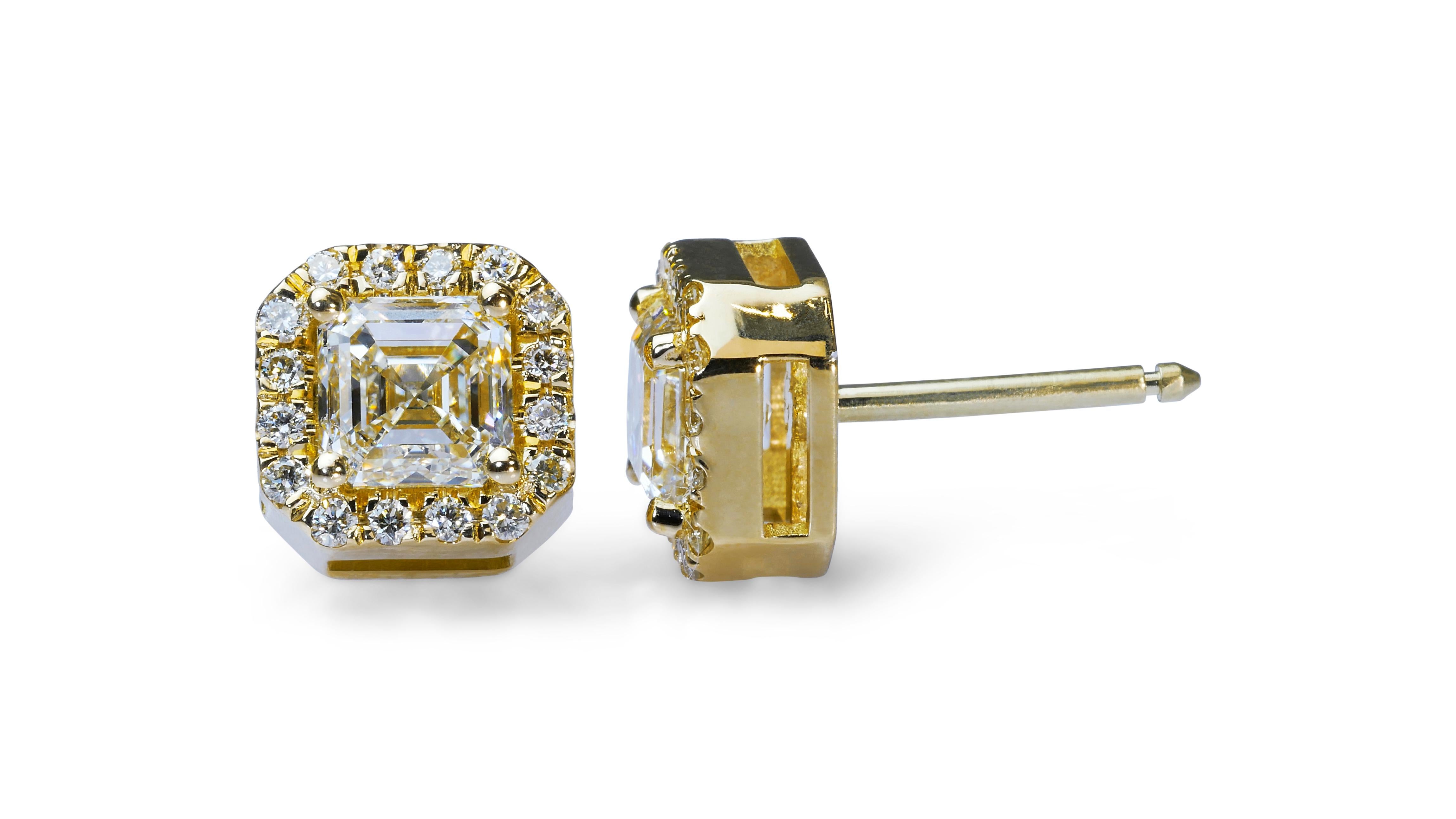 Magnificent 1.74ct Diamond Stud Earrings in 18k Yellow Gold - GIA Certified 

Experience the elegance of these beautiful diamond stud earrings, crafted from 18k yellow gold for a touch of luxury. The main stones feature two square diamonds, totaling