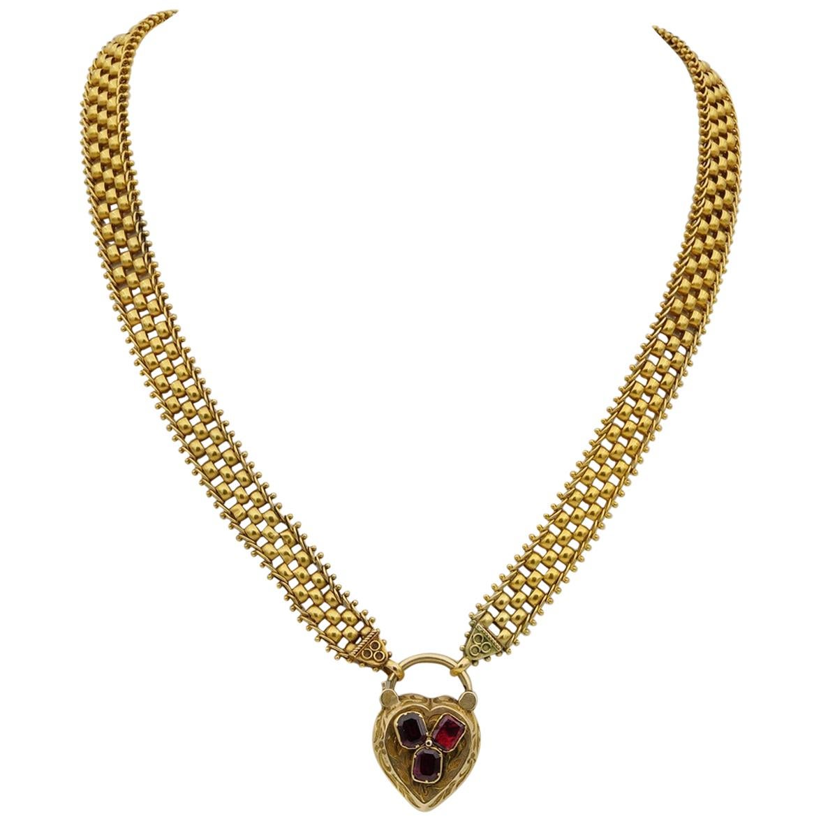 Magnificent 18 Karat gold Mid Victorian Flat Garnet Padlock Boxed Full Necklace For Sale