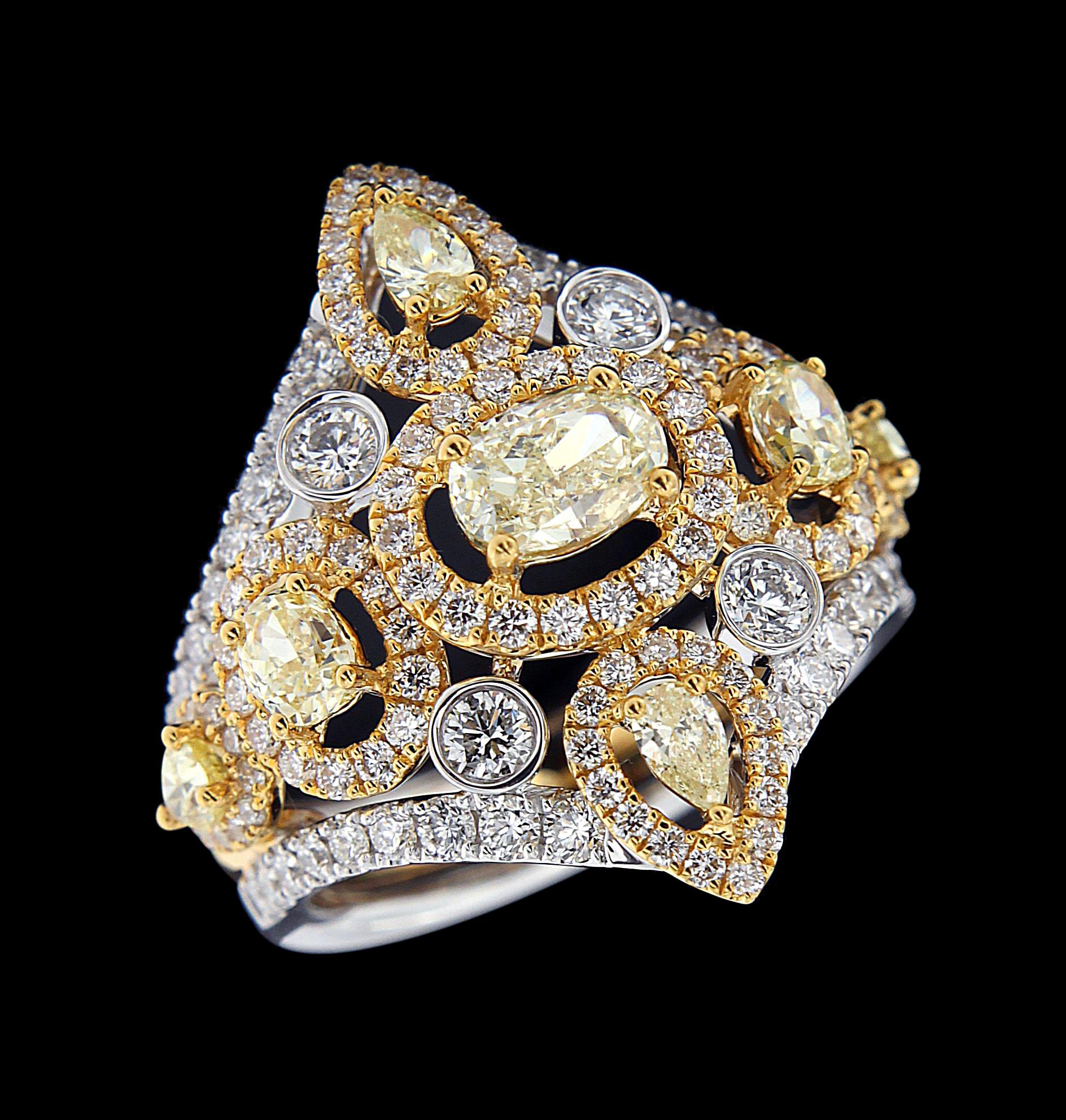 Ring 
Diamonds weighing approximately around 3.478 carats , mounted on 18 karat yellow gold . The ring weighs around 10.264 grams approximately. 

Please note: The prices listed do not include any shipment, TAX, VAT, DUTY, IMPORT, EXPORT