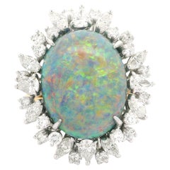Magnificent 18k Gold GIA 12.25ctw Black Opal & Diamond Halo Cocktail Ring