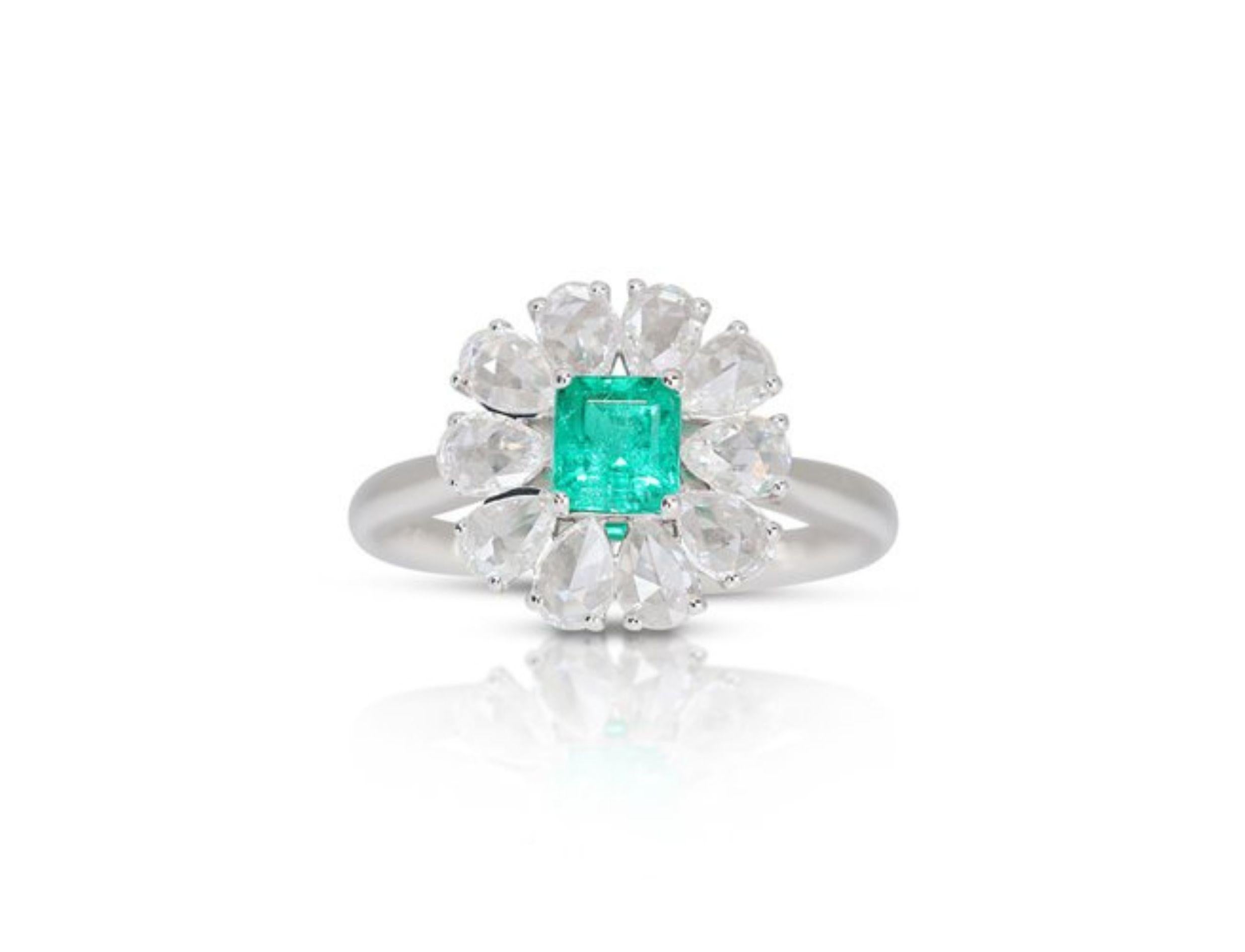 Magnificent 18K White Gold Emerald Flower Ring For Sale 2