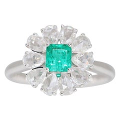Magnificent 18K White Gold Emerald Flower Ring Magnificent 18K White Gold Emerald Flower Ring