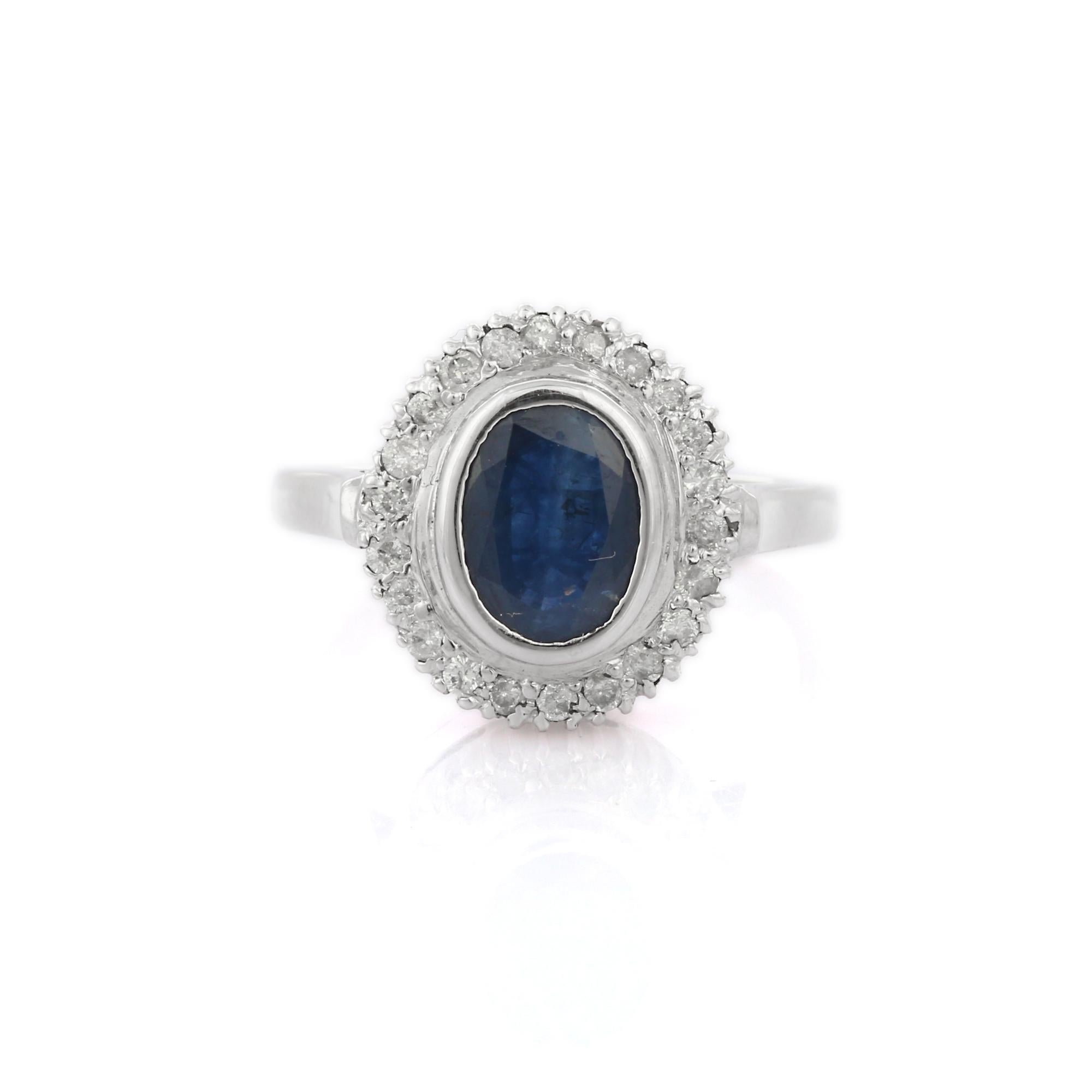 For Sale:  Magnificent 18K White Gold Blue Sapphire and Halo Diamond Ring 2