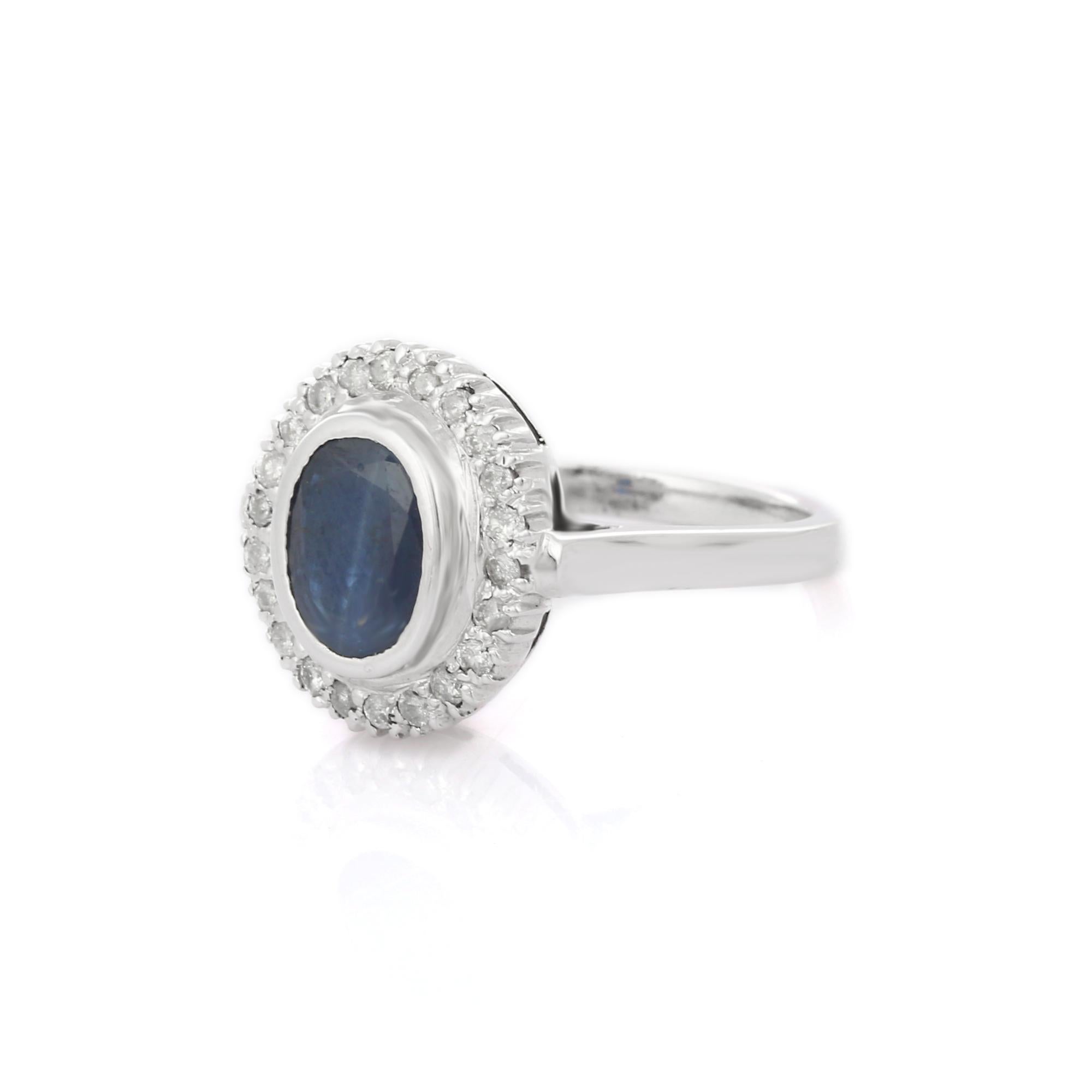 For Sale:  Magnificent 18K White Gold Blue Sapphire and Halo Diamond Ring 3