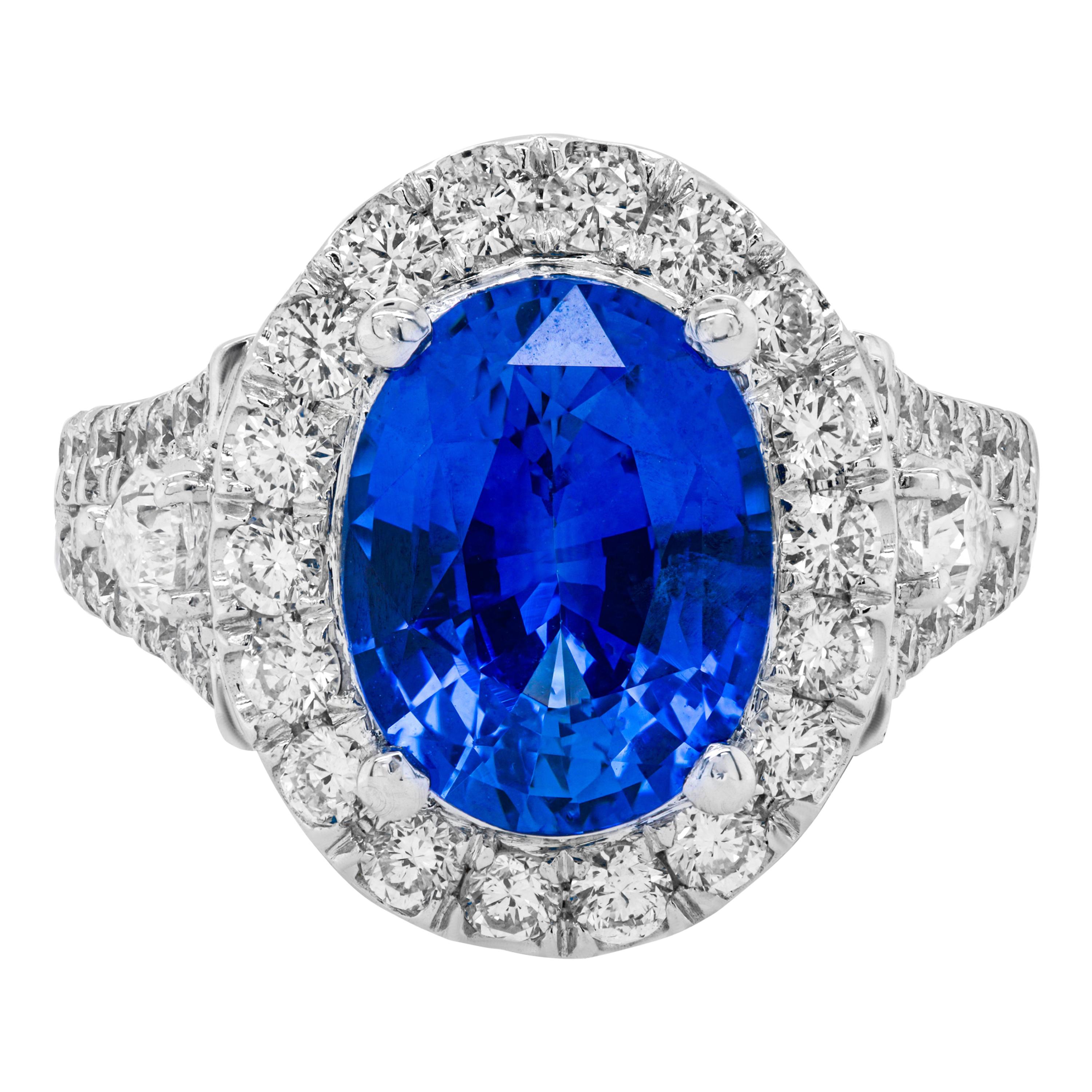 Magnificent 18kt Blue Sapphire Diamond Ring with Two Pear Shape Diamonds For Sale