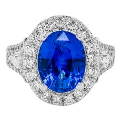 Magnificent 18kt Blue Sapphire Diamond Ring with Two Pear Shape Diamonds