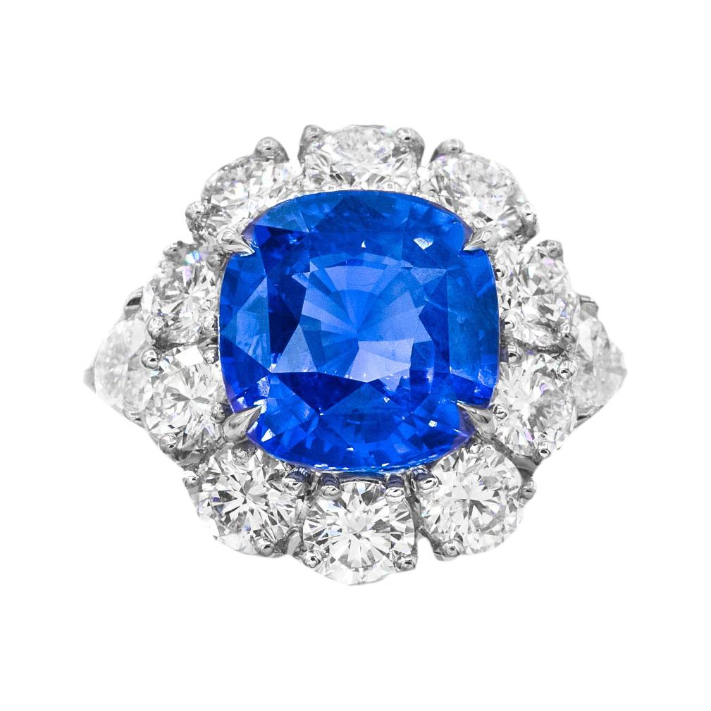 Magnificent 18kt Blue Sapphire Ring with Two Pear Shape and Micropave Diamonds For Sale