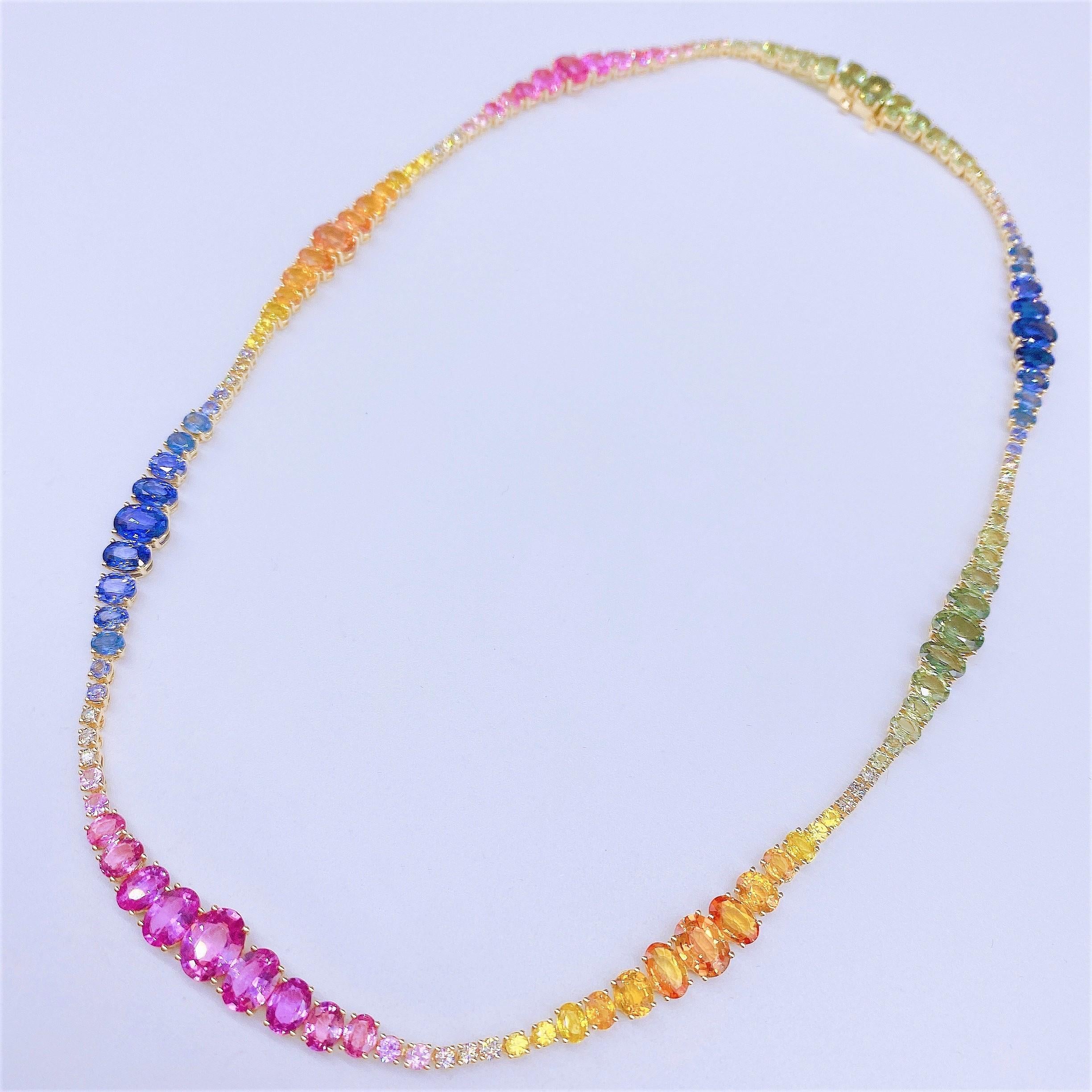 The Following Item we are offering is this Rare Important FANCY MULTI RAINBOW SAPPHIRE AND DIAMOND GOLD NECKLACE!!! Necklace consists of the Most Exquisite Shades of Rainbow Sapphires and Gorgeous Glittering Diamonds set in 18KT Gold!! Total Carat