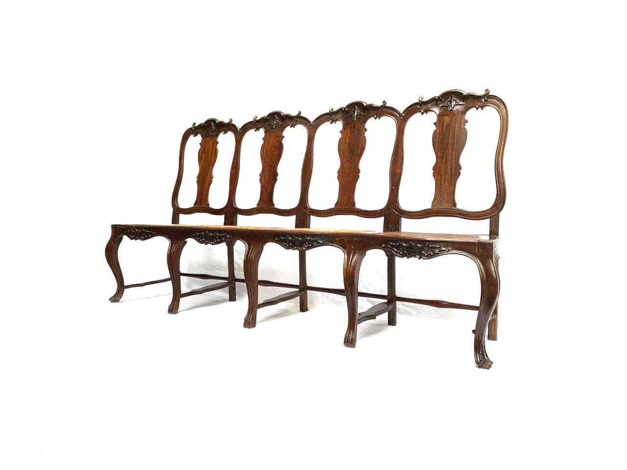 Magnificent 18th Century South American Colonial Escaño Settee in light wood 
Backrest formed by four 