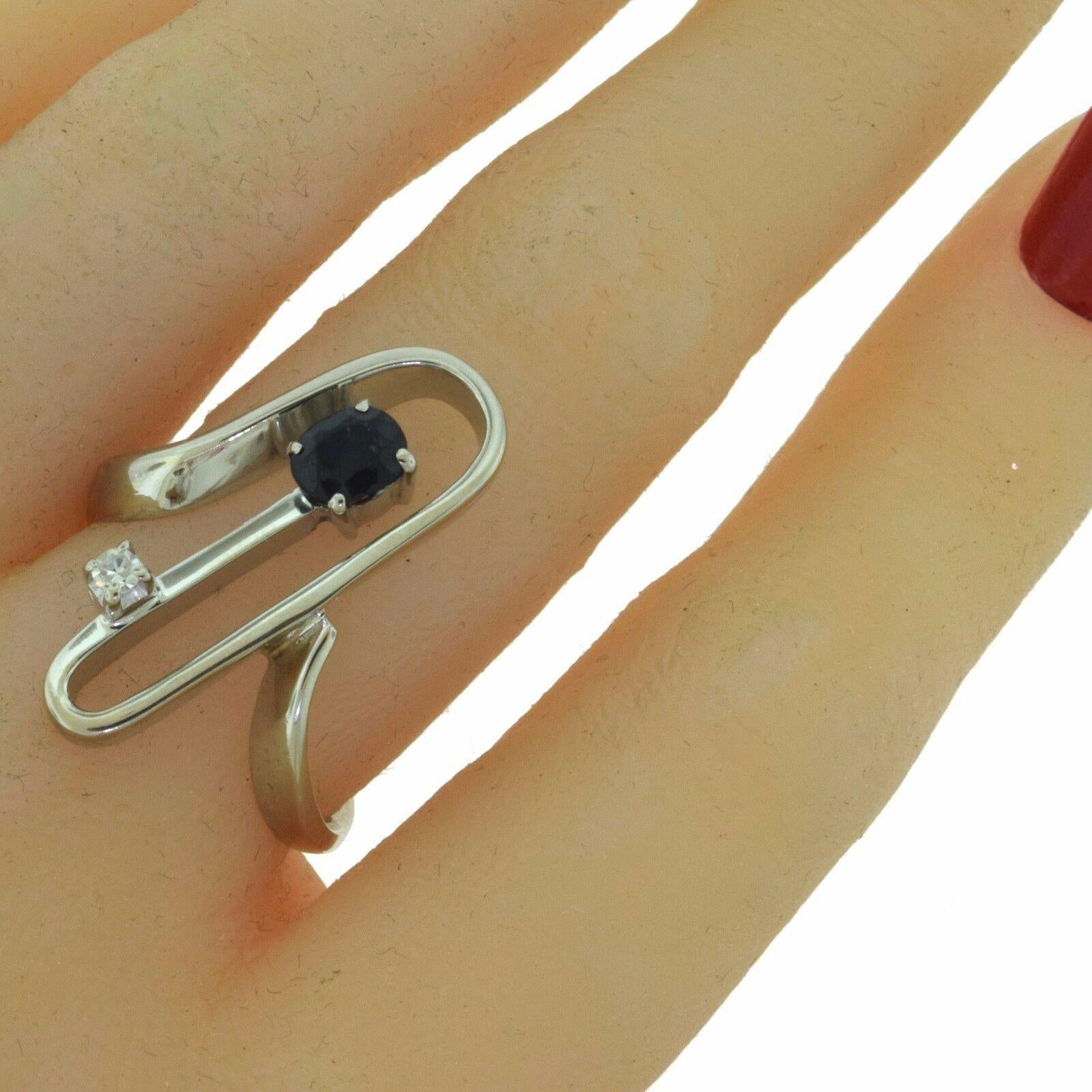 Round Cut Magnificent 1970s Retro Sapphire and Diamond Paper Clip Ring For Sale
