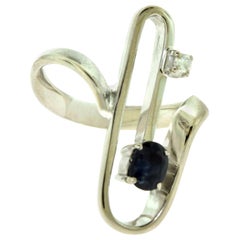 Magnífico anillo clip de zafiro y diamantes retro de los años 70