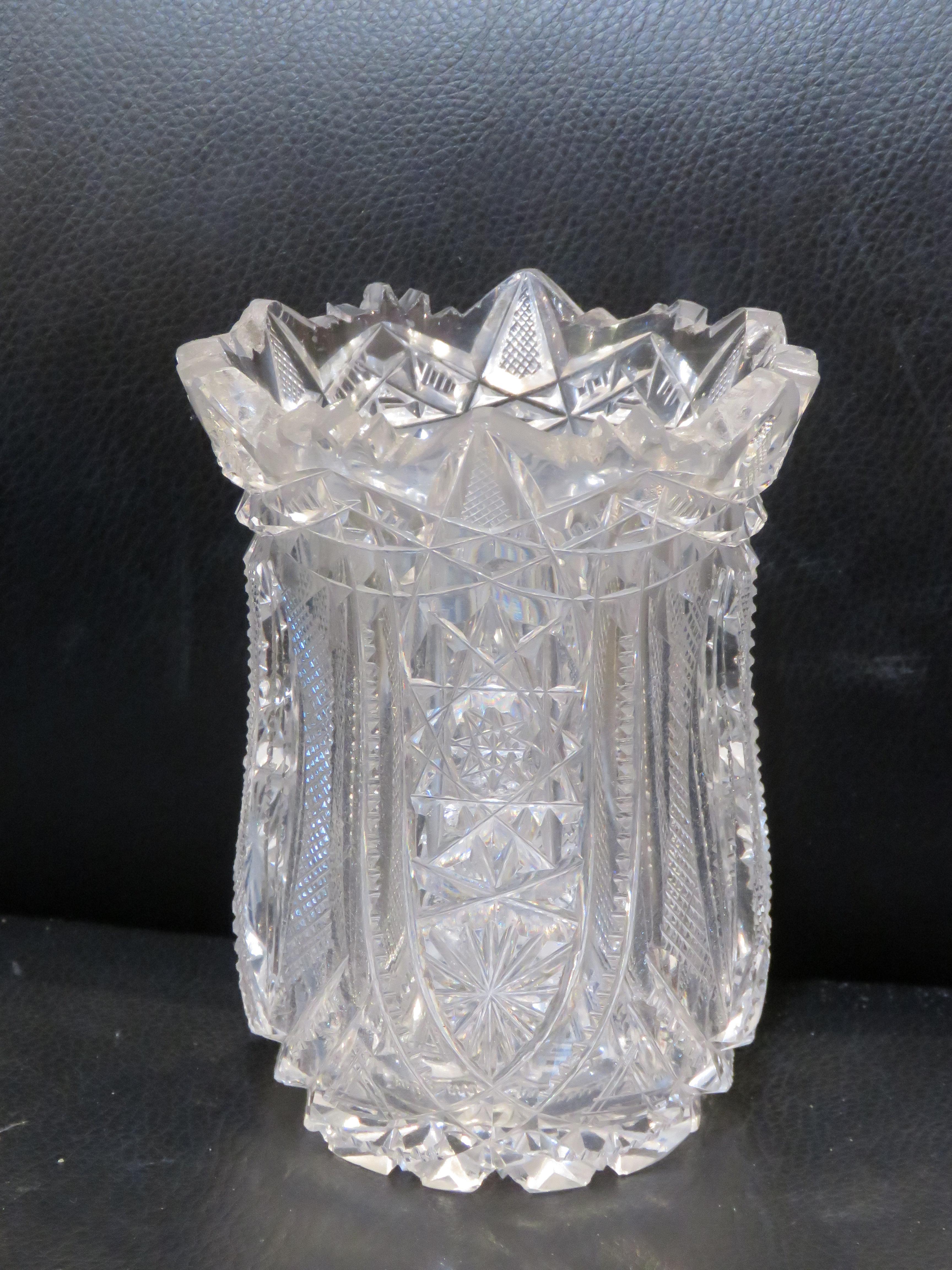 The Following Item we are offering is a Rare Antique Lovely HEAVY HANDCUT Crystal Glass Vase and Candleholder. Vase is Finely Detailed Throughout in a Magnificent Pattern Surrounded Throughout.  

Approx: 5