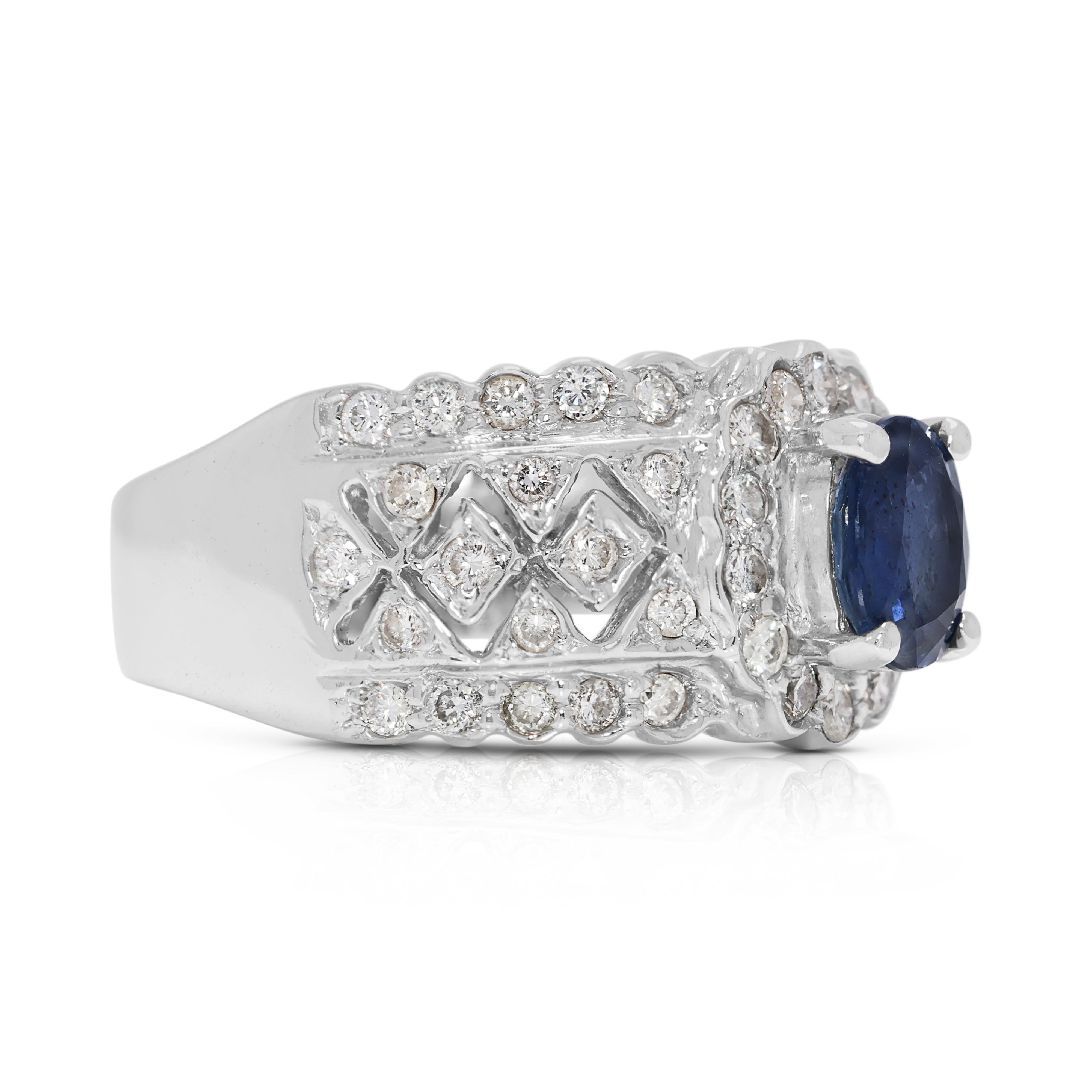 Taille ovale Magnifique bague en or blanc 18 carats ornée d'un saphir ovale de 1ct et d'un diamant naturel en vente