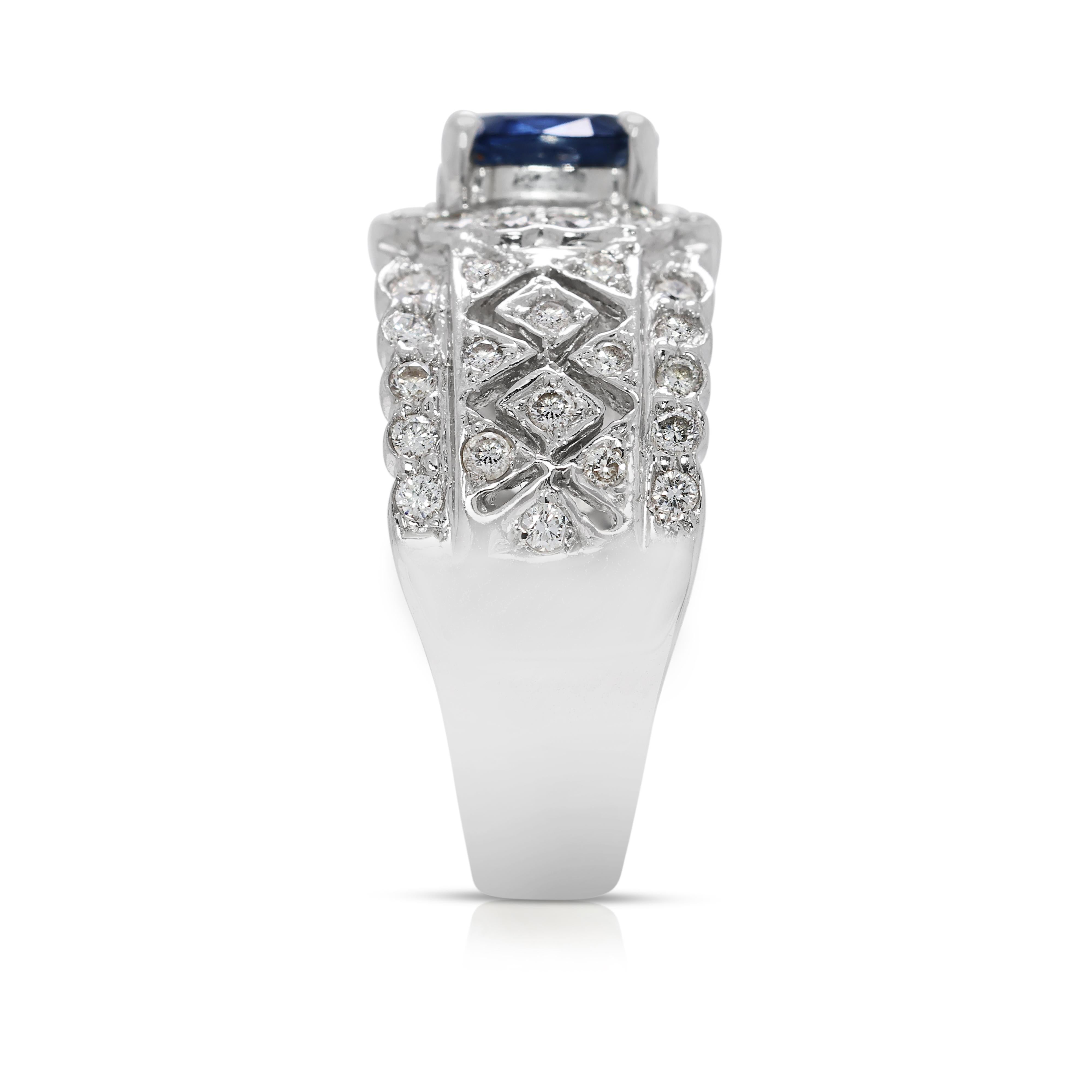 Magnifique bague en or blanc 18 carats ornée d'un saphir ovale de 1ct et d'un diamant naturel en vente 1