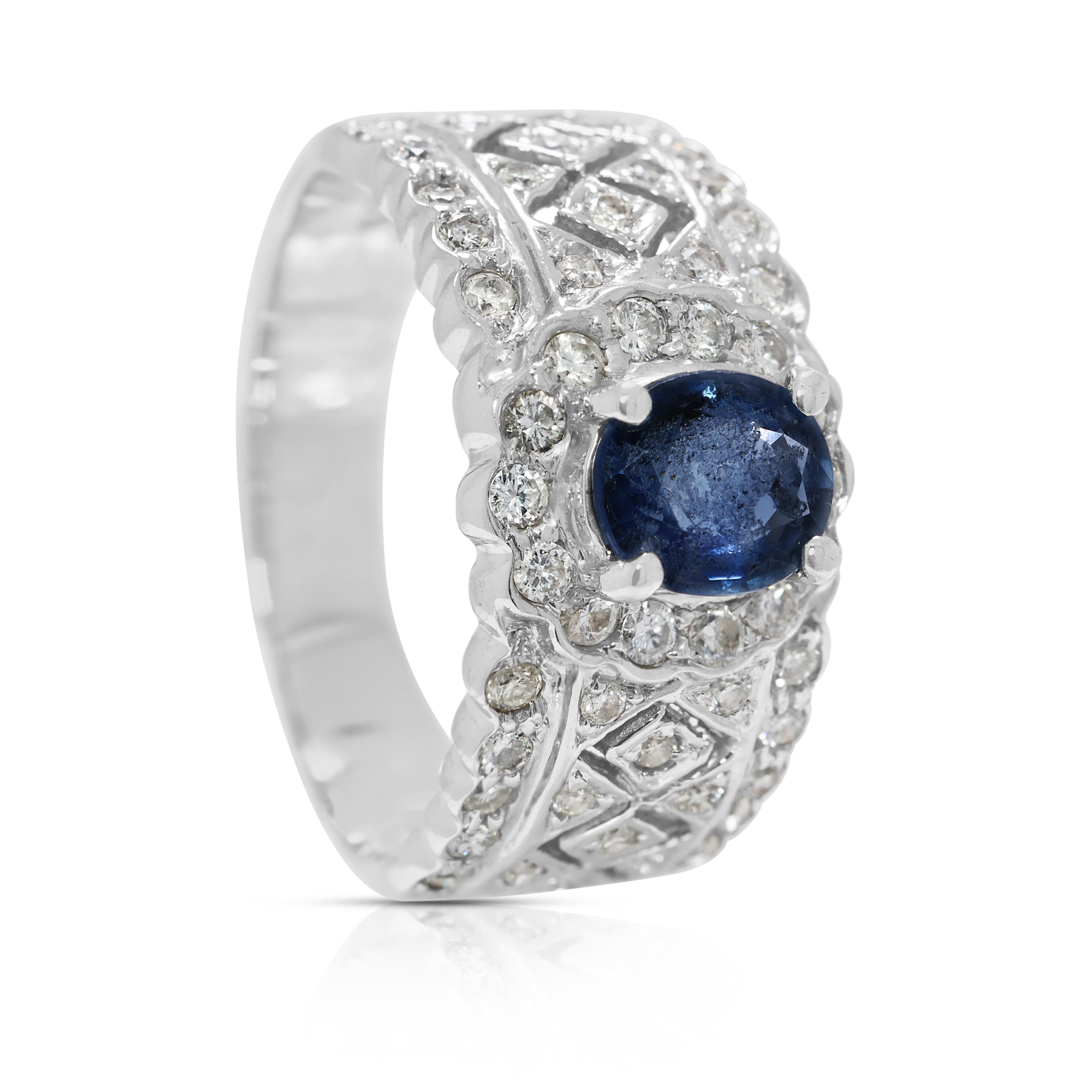 Magnifique bague en or blanc 18 carats ornée d'un saphir ovale de 1ct et d'un diamant naturel en vente 2