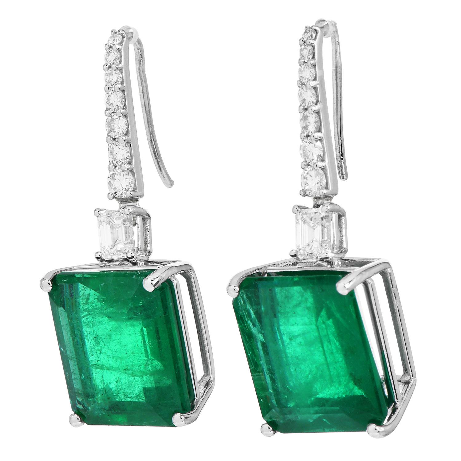 Celebrate yourself with these lovely sparkly dangle drop earrings, perfect for special occasions.

These earrings are crafted in solid 18k white gold, displaying two genuine emerald-cut emeralds weighing approx. 27.75 carats in total.

Round, and