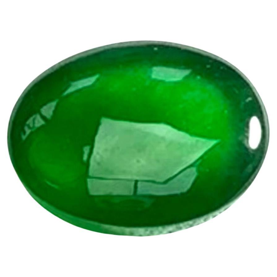 Magnificent 35.67ct Jade Gemstone - IGI Certified

Behold a 35.67-carat magnificent jade of unparalleled beauty, exuding a captivating aura with its intense green hue. Fashioned into an elegant oval shape, this jade showcases its natural beauty with