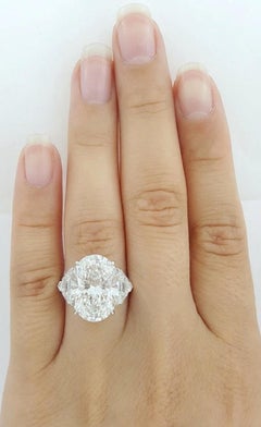 Magnificent 4.02 Carat Oval Brilliant Diamond Three-Stone Ring