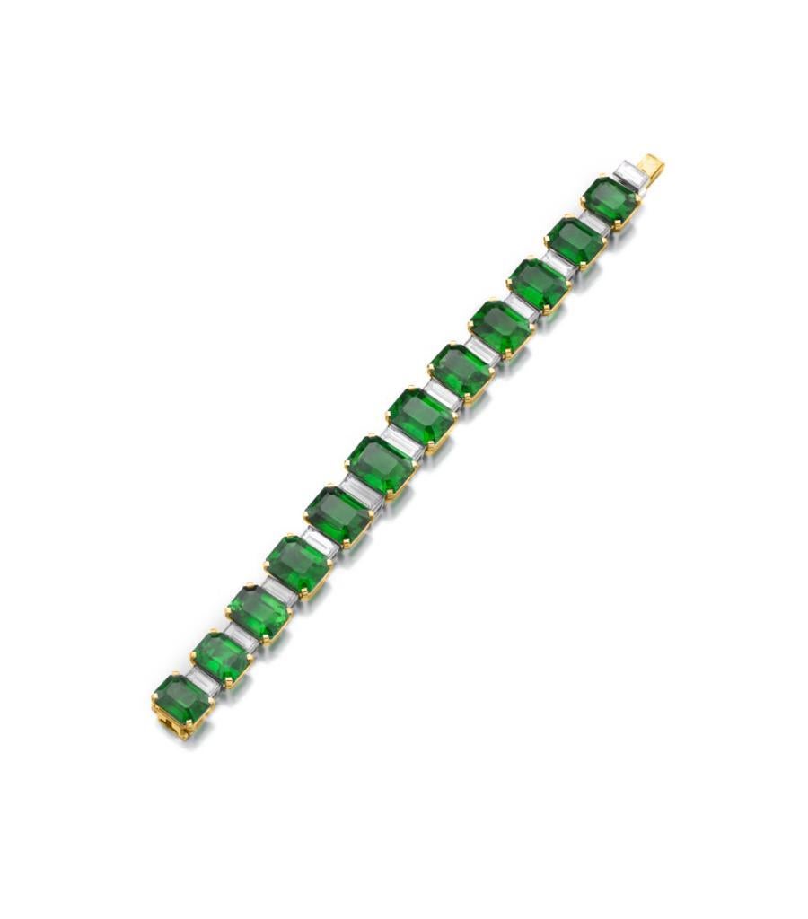 The Ultimate Emerald Bracelet! Major statement!
Emeralds each weighing between 2.40-2.80 Carat each, spaced by Emerald Cut Diamonds, each weighing 0.45-0.51ct.
Each Diamond is individually certified by GIA
Set in Platinum and 18 Karat Yellow