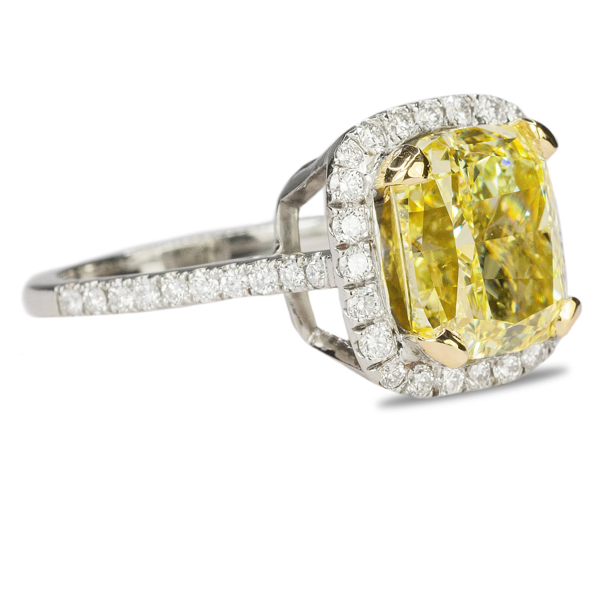 Ball of Sunshine, 18k Ring with GIA certified 4.46 carat cushion cut Fancy Intense Yellow,  VS2 clarity diamond and 0.68 carats of round white diamonds.  