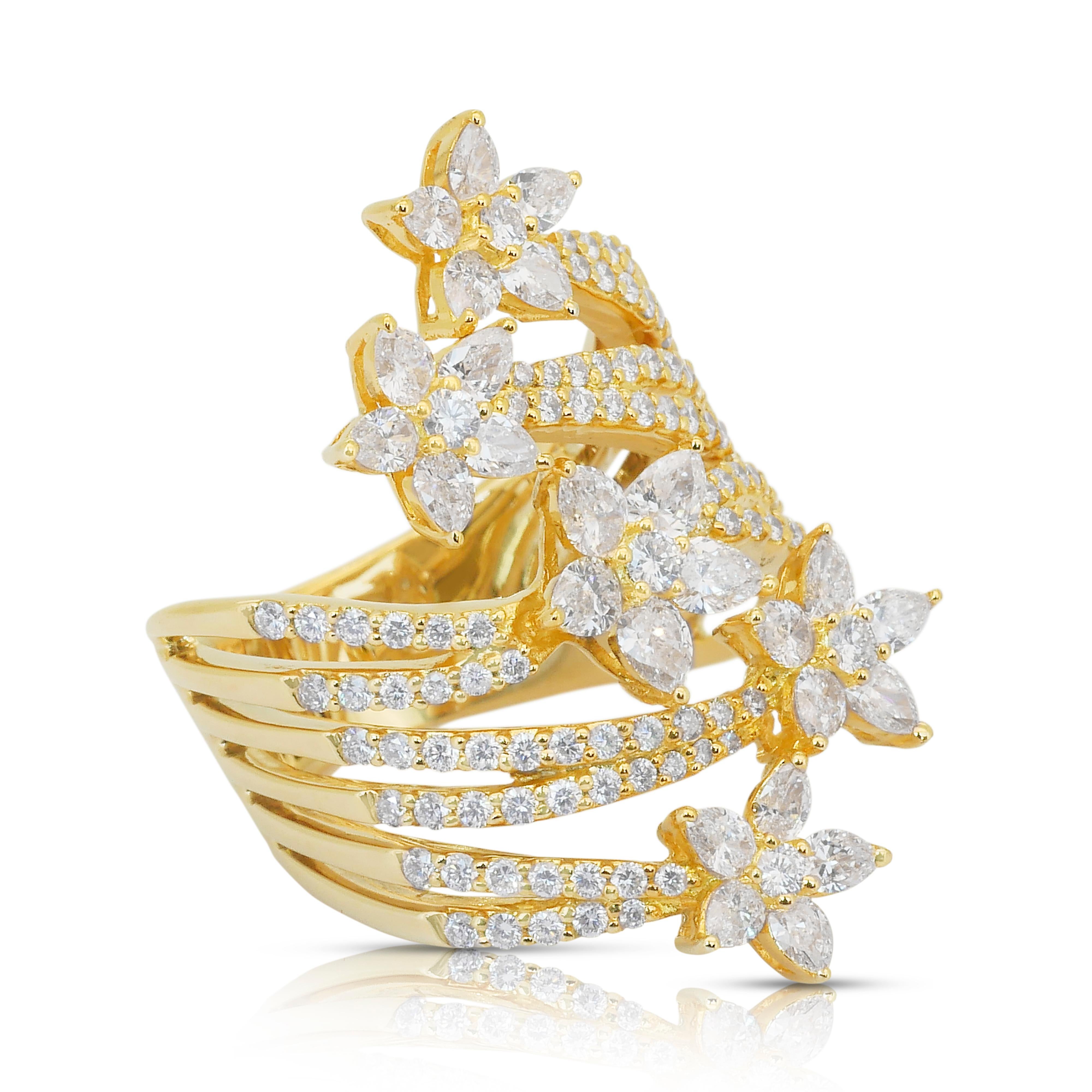 Magnificent 4.51ct Natural Diamonds Cocktail Ring in 18k Yellow Gold - IGI Certified

Experience the epitome of luxury with this mesmerizing 18K yellow gold diamond cocktail ring. Featuring 25 exquisite pear-shaped diamonds totaling 3.13ct, this