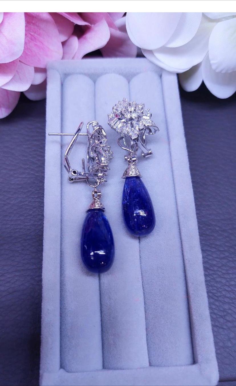 Women's Magnificent  68.25 carats of tanzanites and diamonds on earrings  For Sale