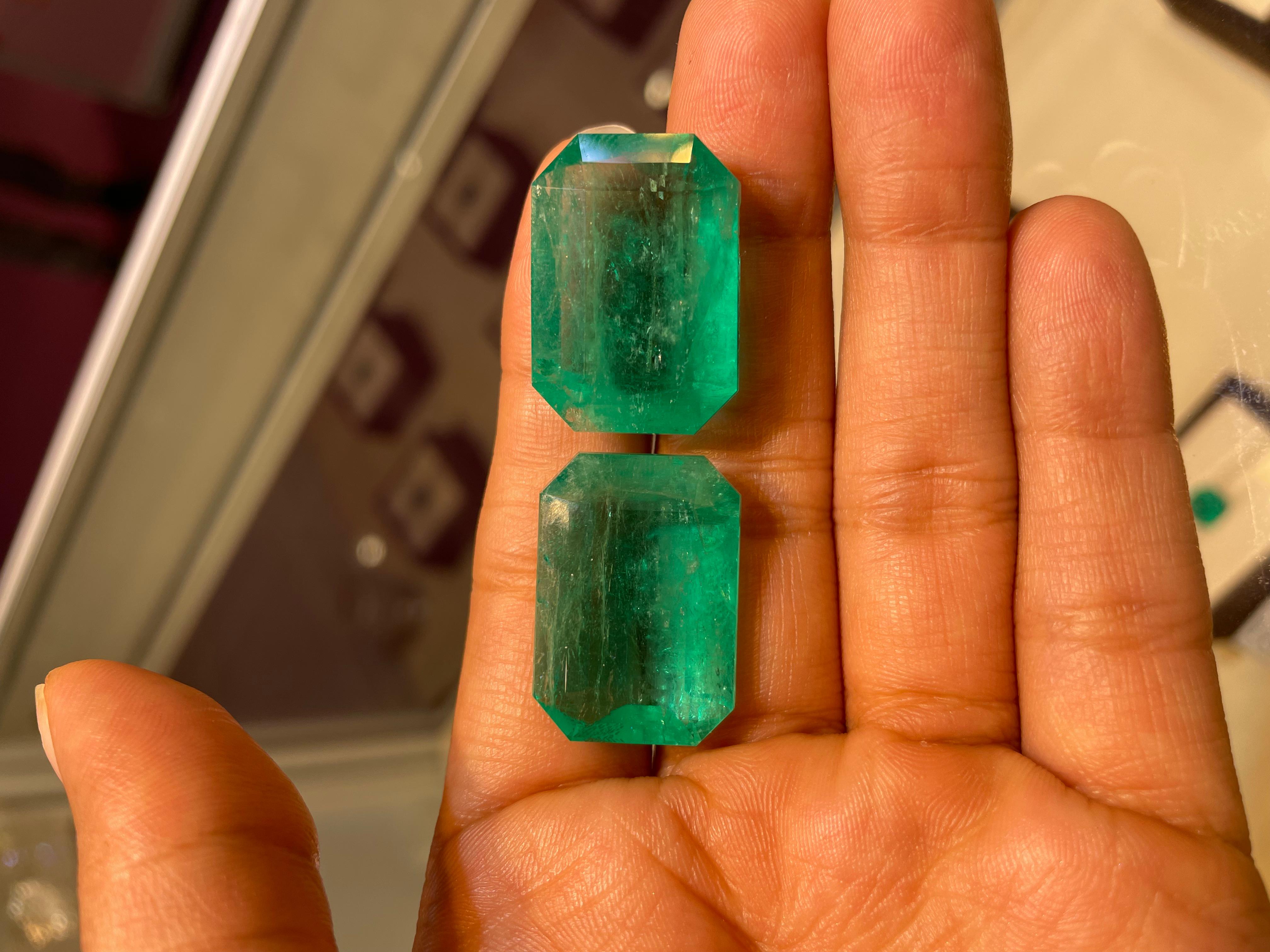 This exceptional 81.65 carat pair of Colombian emeralds is a rare and timeless treasure, featuring a perfectly matched duo in a classic octagon cut, sourced from the legendary Muzo/Chivor region. Known for producing the world’s most vibrant and