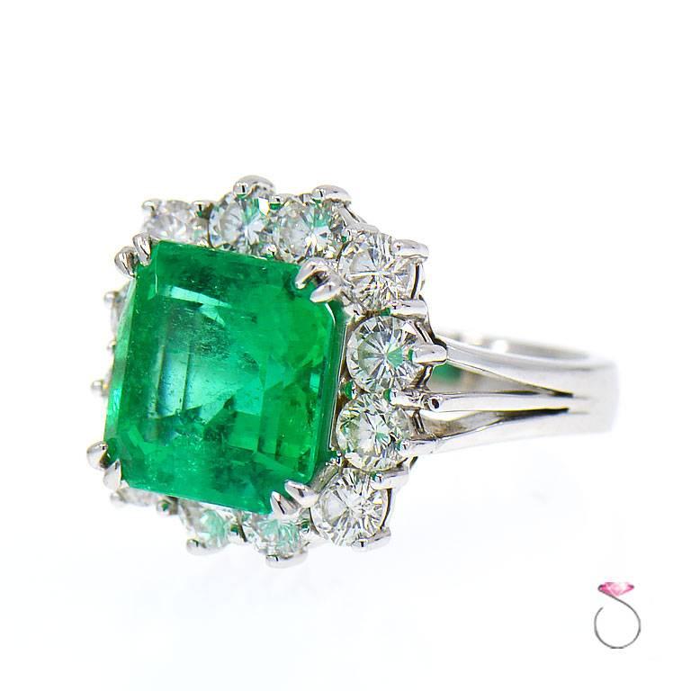 Emerald Cut Magnificent 8.50 ct. Fine Colombian Emerald & Diamond Halo Platinum Ring, GIA