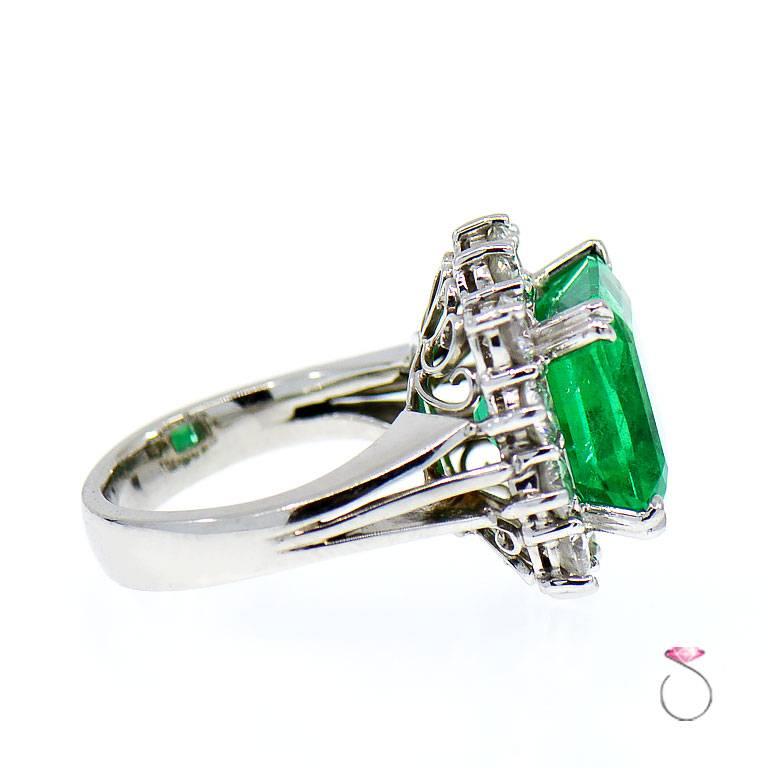 Magnificent 8.50 ct. Fine Colombian Emerald & Diamond Halo Platinum Ring, GIA 1