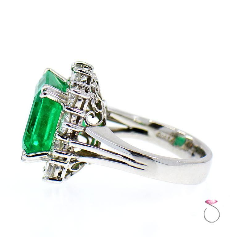 Magnificent 8.50 ct. Fine Colombian Emerald & Diamond Halo Platinum Ring, GIA 2