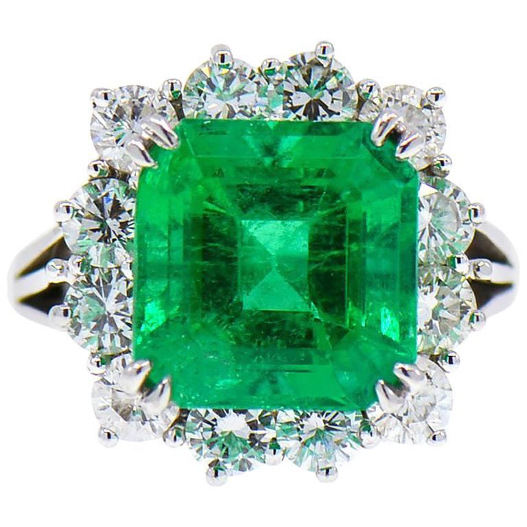 Magnificent 8.50 ct. Fine Colombian Emerald & Diamond Halo Platinum Ring, GIA