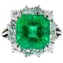 Vintage Magnificent 8.50 ct. Fine Colombian Emerald & Diamond Halo Platinum Ring, GIA